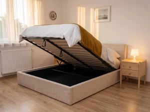 Čalúnená posteľ s úložným priestorom 140×200 cm Tilo Velvet – Béžová