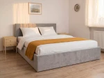 Čalúnená posteľ s úložným priestorom 140×200 cm Tilo Velvet – Šedá