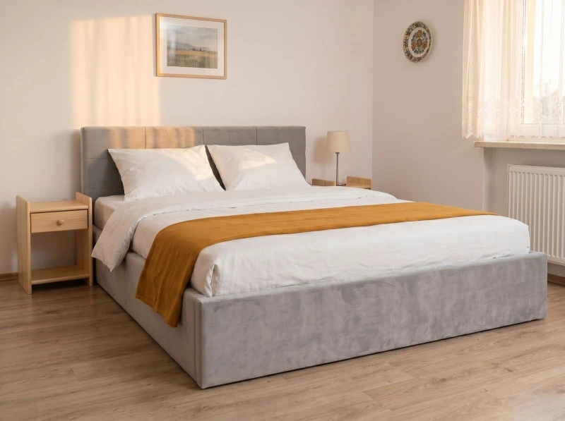 Čalúnená posteľ s úložným priestorom 140×200 cm Tilo Velvet – Šedá