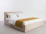Čalúnená posteľ s úložným priestorom 140×200 cm Rema Velvet – Béžová